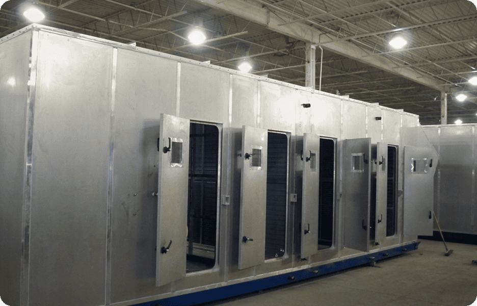 Large industrial refrigeration units with open doors.