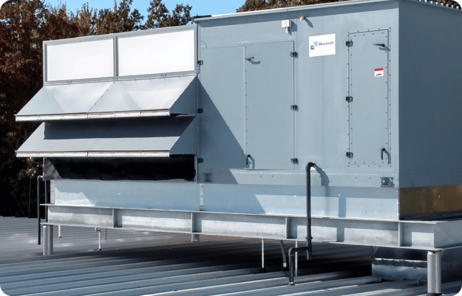 Rooftop industrial ventilation system on building.