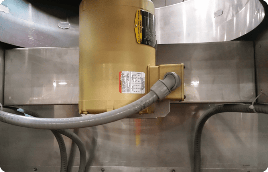 Industrial motor with attached cables.