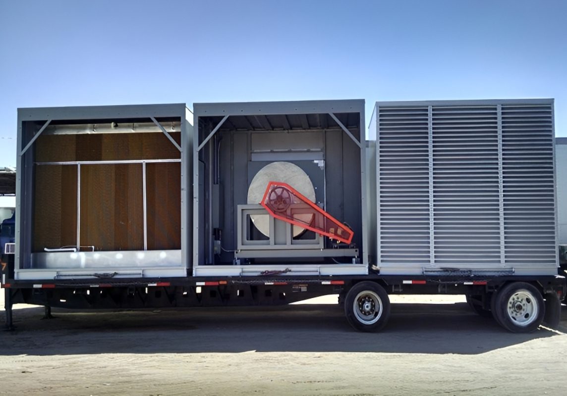 Industrial equipment on flatbed trailer outdoors.