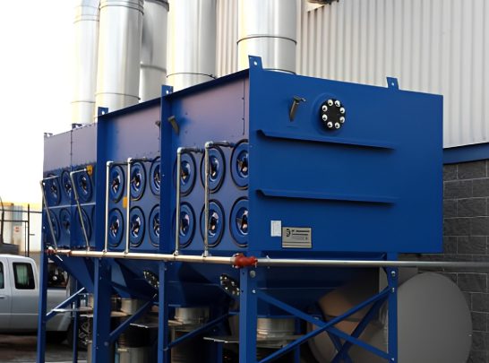 Industrial blue dust collector with multiple filters.
